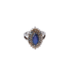 Bague en métal argenté sertie d’une pierre de zircon bleu