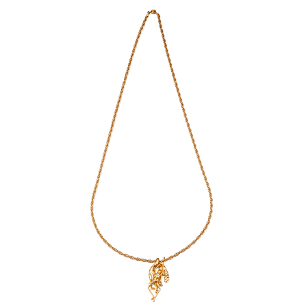 Collier doré avec pendentif silhouette dansante, chaîne torsadée raffinée.